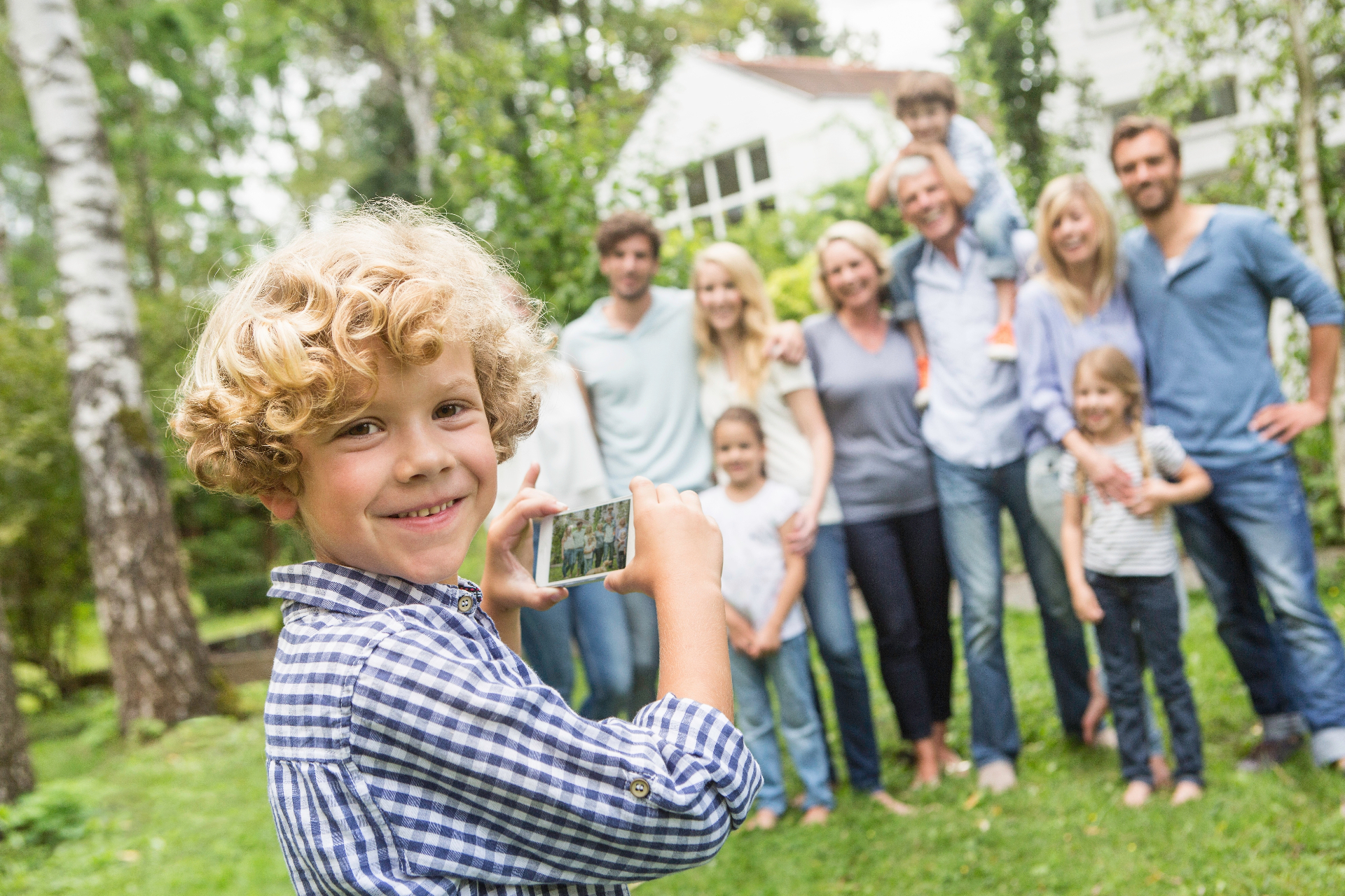 Happy executive family arriving at an elegant upscale home in Middle Tennessee at golden hour